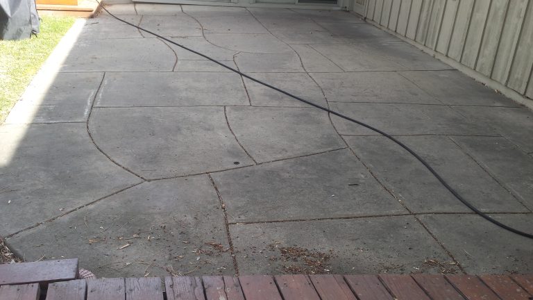 Patio before professional pressure washing